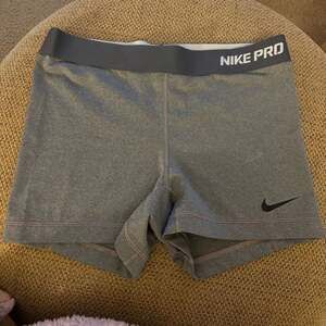 Nike Pro Women's Dri-FIT compression spandex shorts in heather gray